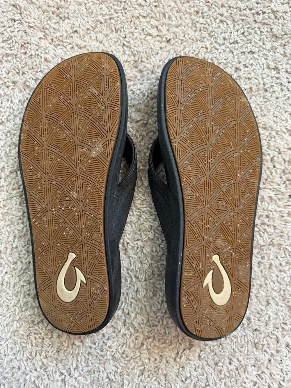 OluKai Black Flip Flop Sandals with Subtle Logo